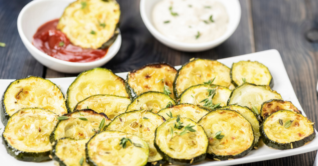 A plate of roasted, sliced zucchini